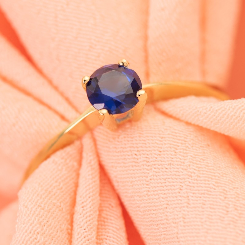 Solitario Oro Amarillo Con Circonita Azul 4 Garras De 5 mm oro 18k