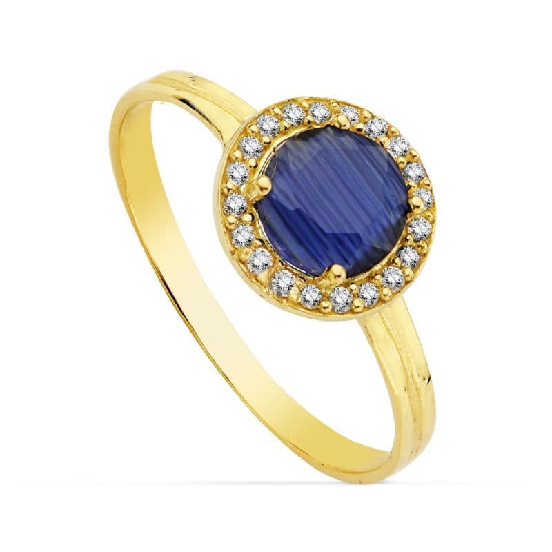 Sortija Oro Amarillo Motivo Redondo Circonita Azul 6 mm. Ancho: 9 mm oro 18k