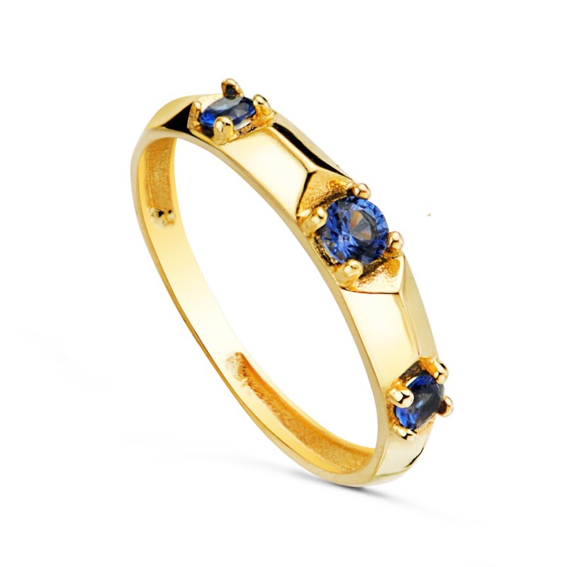 Sortija Oro Amarillo Tres Piedras Color Azul En 4 Garras. Ancho: 3mm oro 18k