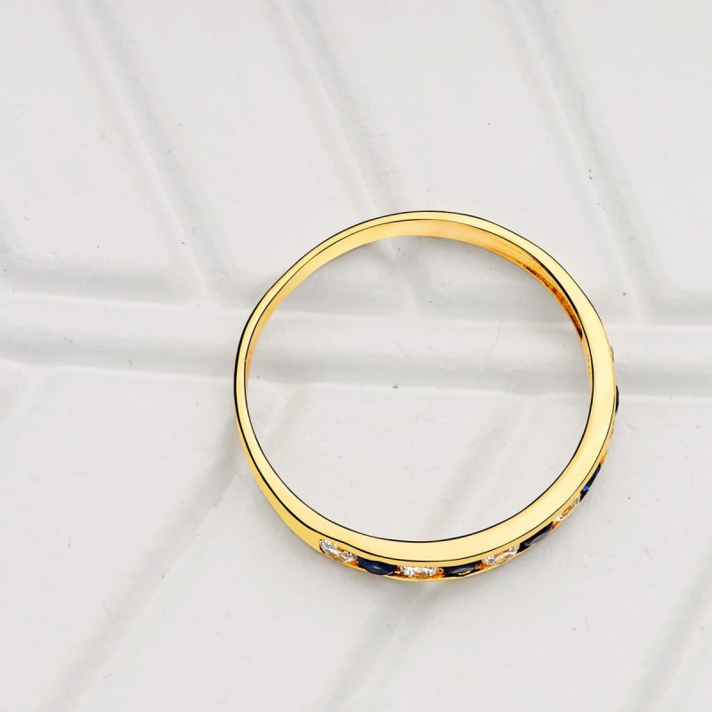 Sortija Oro Amarillo Circonita Azules. Ancho Cuerpo 2.5 mm oro 18k