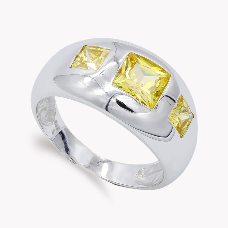 Sortija Oro Blanco Con Circonita Amarillas. Ancho: 11 mm oro 18k