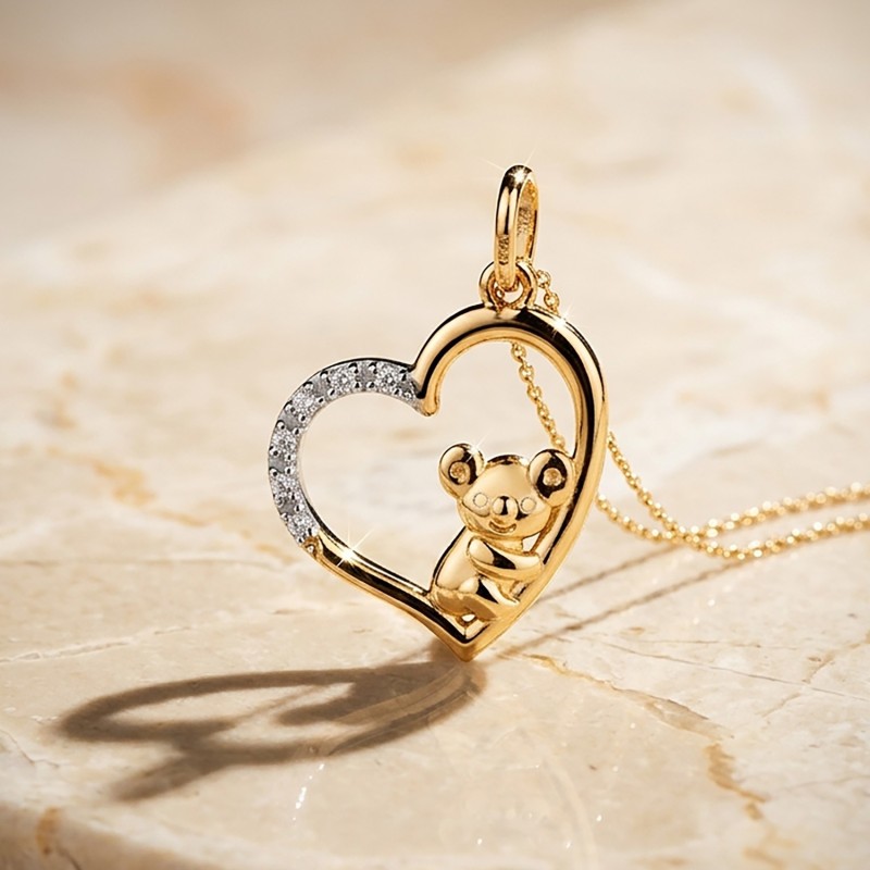 Colgante Oro Bicolor Corazón y koala con circonitas. Medida 19x15 mm. Oro 18k